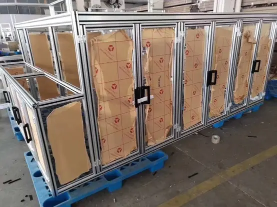 Complete T-slot aluminum extrusion frame system fully assembled with industrial accessories including connectors, brackets, handles and panels by Yoverd Aluminium. Ideal for modular framing, machine guarding and industrial structures