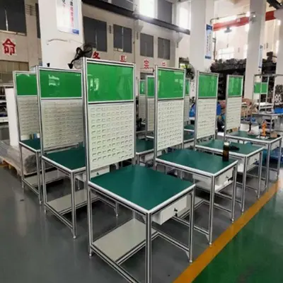 Custom T-slot aluminum extrusion workbench installed in a garment factory in Vietnam. Durable modular industrial workbench solution with 3000 pcs quantity - By Yoverd Aluminium