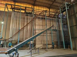 Precision manufacturing and stable quality control in aluminum extrusion facility by Yoverd Aluminium, showing large-scale hanging production line with hundreds of profiles for ultra-high dimensional accuracy, perfect straightness and consistent mechanical performance