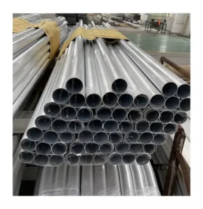 High-quality circular aluminum extrusion profiles bundled and stacked in our factory, showcasing durable, precision-engineered, lightweight silver aluminum tubes with hollow structure. Premium custom solutions by Yoverd Aluminium for industrial, construction and various applications.