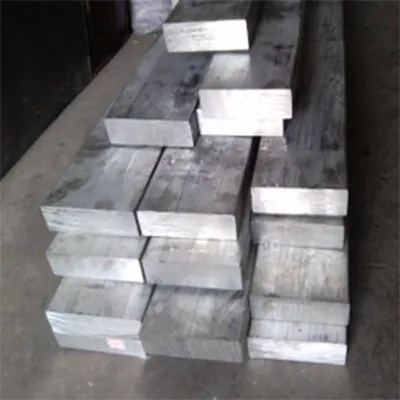 Precision CNC machined solid aluminum rectangular bars stacked in industrial warehouse, showcasing high-quality extruded aluminum stock ready for custom fabrication by Yoverd Aluminium.
