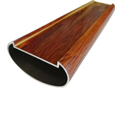 Close-up of a premium wood-grain finished aluminum railing profile featuring rich brown texture and sleek hollow design, ideal for commercial and public infrastructure by Yoverd Aluminium.