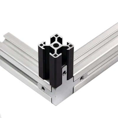 Industrial aluminum extrusion corner connector with precise cross-section and mounting holes for assembling sturdy enclosure frames used in equipment protection and integrated systems by Yoverd Aluminium.