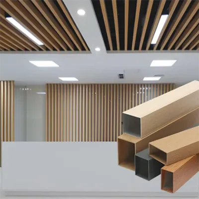 Modern architectural interior featuring high-performance aluminum profiles in various finishes displayed in the foreground with sleek wooden slat ceiling and wall panels, showcasing premium facade system applications by Yoverd Aluminium.