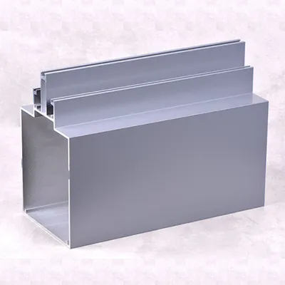 Close-up view of high-performance silver aluminum profiles with precise rectangular and channel extrusions, demonstrating superior structural design and smooth finishes ideal for architectural facade systems by Yoverd Aluminium.