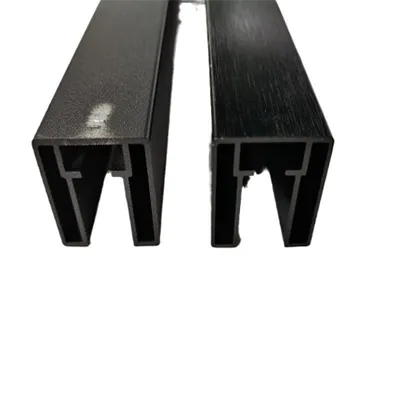Two high-quality black aluminum stair railing profiles displayed in cross-section view, showcasing strong U-shaped channels and precise extrusion details for durable installation, by Yoverd Aluminium