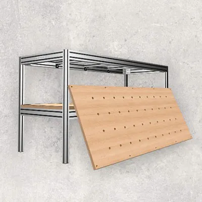 High strength aluminum profiles constructed into a stable modular frame for custom workstation and assembly table, paired with a large perforated wooden worktop panel by Yoverd Aluminium.