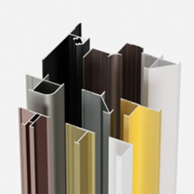 Collection of modern decorative aluminum profiles in various colors and shapes including black, white, gold, brown and grey, displayed upright to showcase their architectural design for living spaces by Yoverd Aluminium.