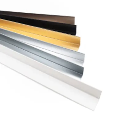 Assortment of long decorative aluminum profiles in white, silver, gold, black and brown finishes arranged diagonally, highlighting their sleek design for modern interior architectural living spaces by Yoverd Aluminium.