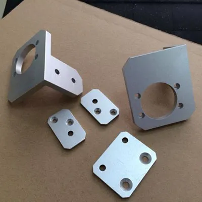 Collection of high precision CNC machined aluminum automotive brackets and mounting plates in various shapes with holes for lightweight vehicle structural applications by Yoverd Aluminium.