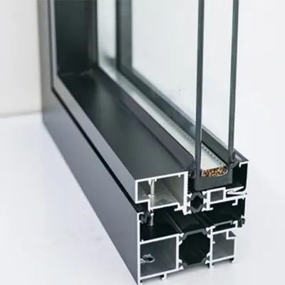 High-quality black thermal break aluminum door profile showcasing internal polyamide strip and multi-cavity design for enhanced thermal insulation and durability by Yoverd Aluminium.