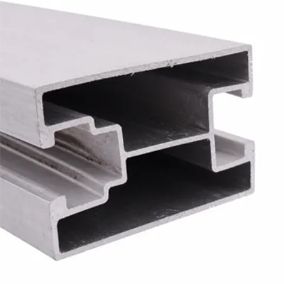 Close-up view of stacked custom aluminum extrusion profiles with specialized channel designs for solar PV mounting systems by Yoverd Aluminium.